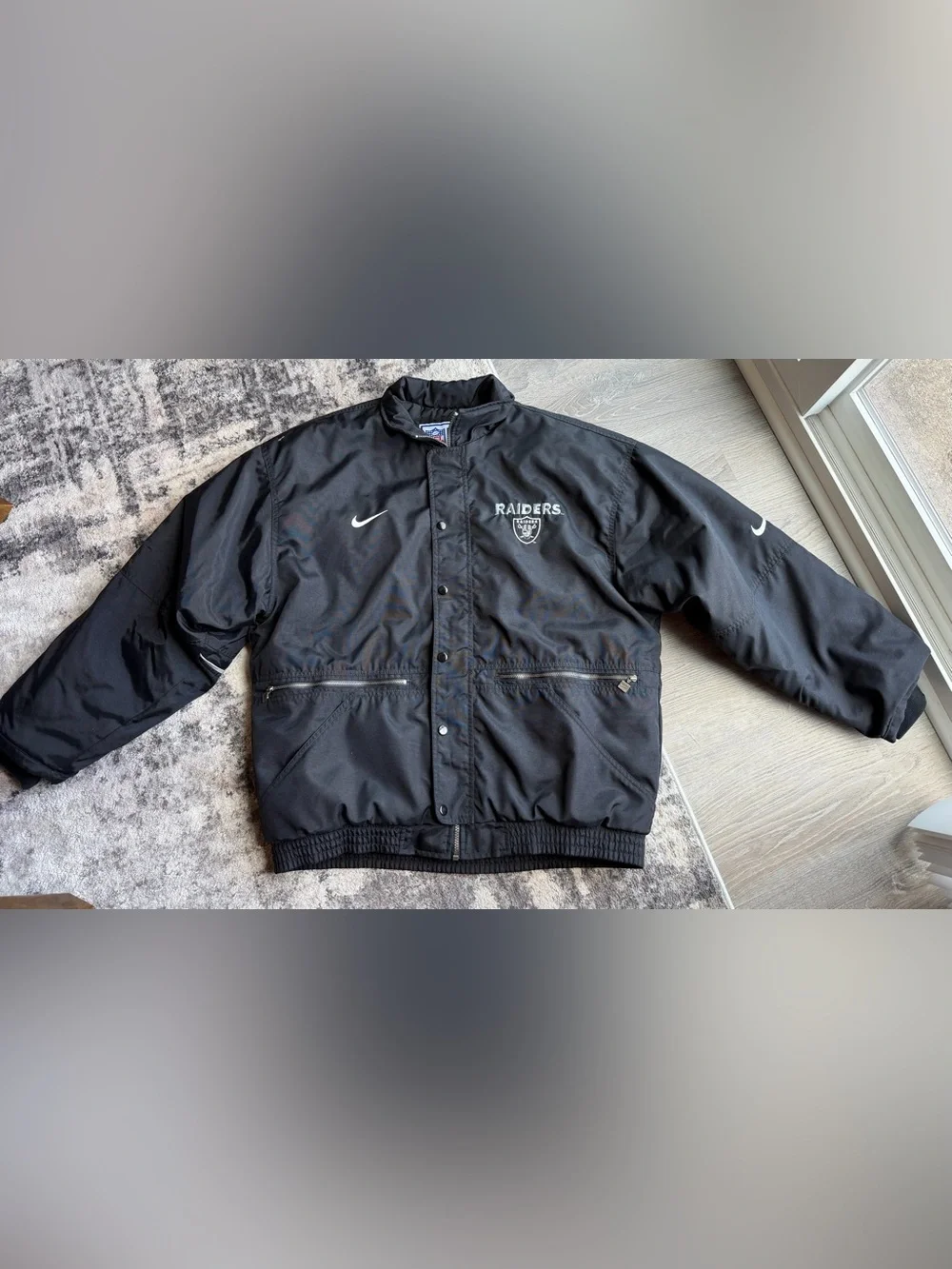 Vintage 1990s Nike Pro Line Oakland Raiders black full-zip jacket size M